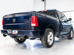 AWE 0FG Dual Rear Exit Catback for 4th Gen RAM 1500 5.7L (with bumper cutouts) - Diamond Black Tips - out of package