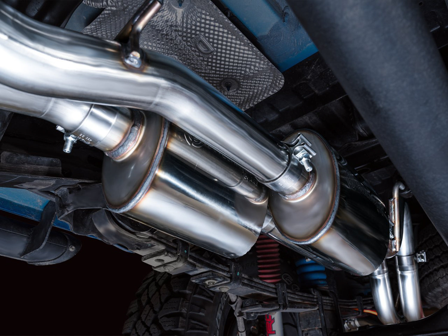 AWE 0FG Exhaust with BashGuard for 3rd Gen Tacoma - Dual Chrome Silver Tips - Mounted