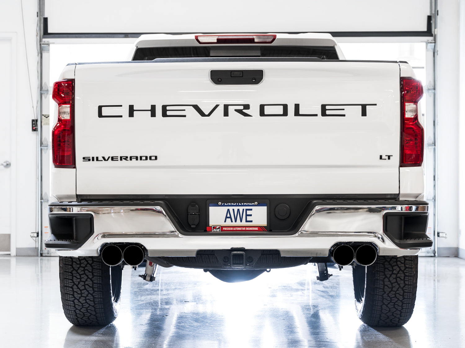 AWE 0FG Catback Split Rear Exit Exhaust for 4th Gen Silverado/Sierra 1500 6.2L (With Bumper Cutouts) - Quad Diamond Black Tips - Mounted