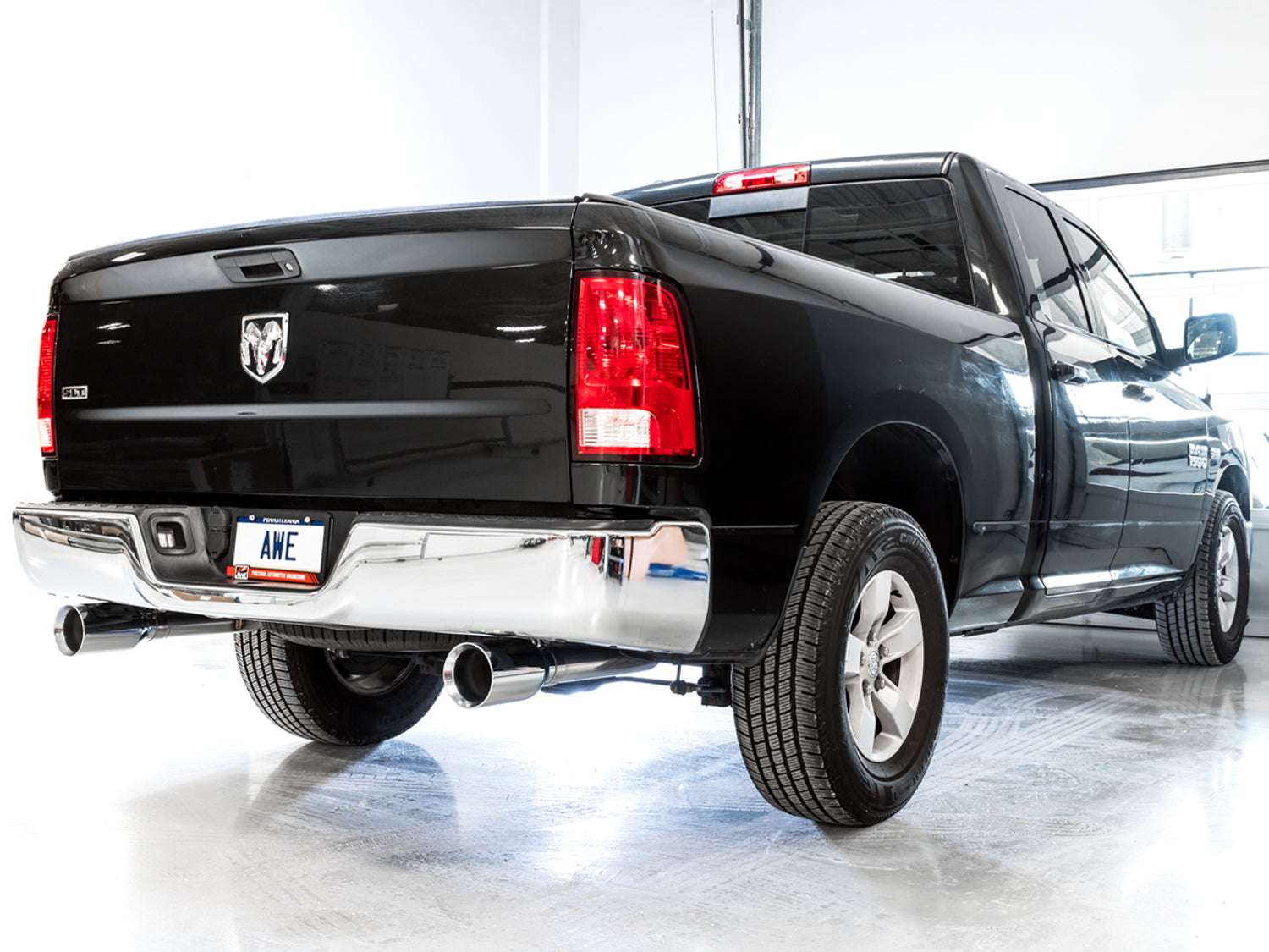 AWE 0FG Dual Rear Exit Catback for 4th Gen RAM 1500 5.7L (without bumper cutouts) - Chrome Silver Tips - Mounted