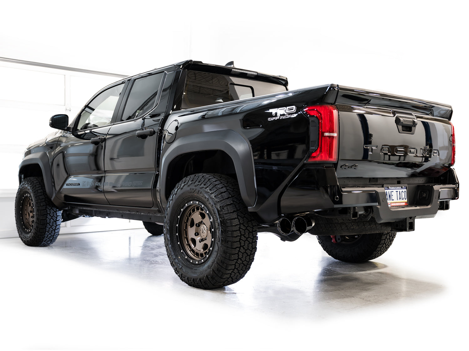 AWE 0FG Exhaust for 4th Gen Toyota Tacoma - Dual Diamond Black Tips - Mounted
