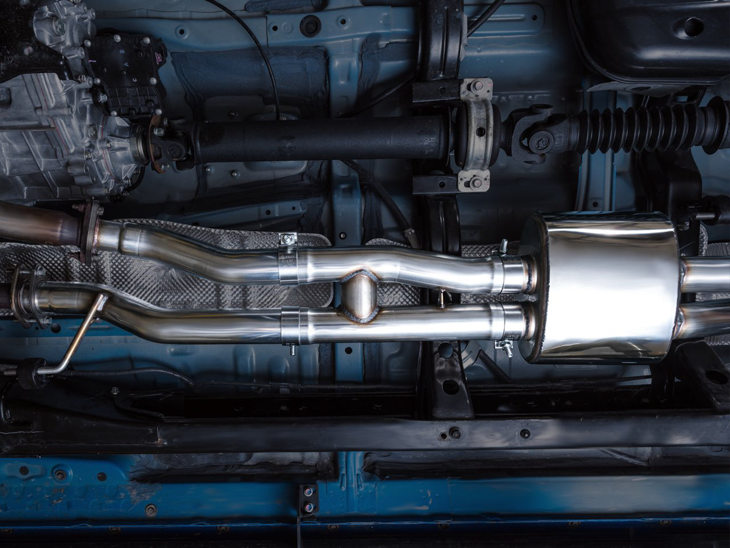 AWE 0FG Exhaust with BashGuard for 3rd Gen Tacoma - Dual Chrome Silver Tips - Mounted