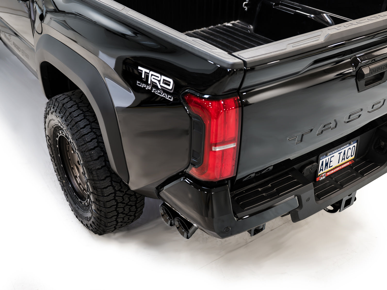 AWE 0FG Exhaust for 4th Gen Toyota Tacoma - Dual Diamond Black Tips - Mounted