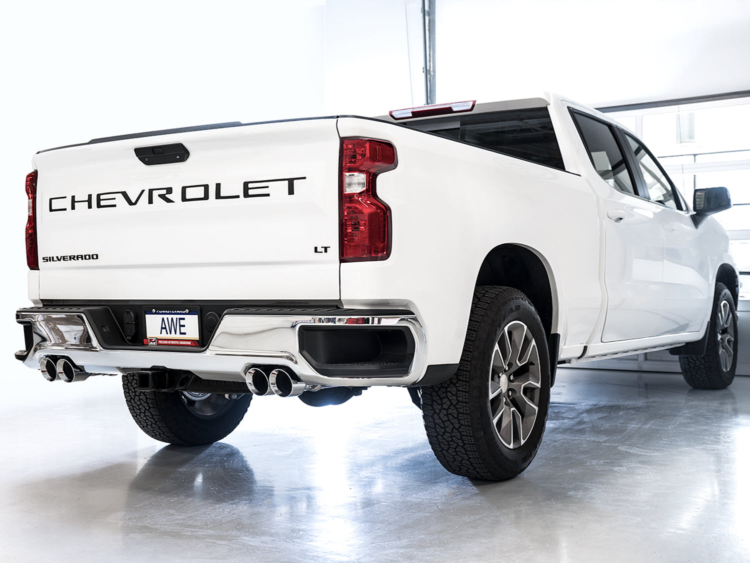 AWE 0FG Catback Split Rear Exit Exhaust for 4th Gen Silverado/Sierra 1500 6.2L (with bumper cutouts) - Quad Chrome Silver Tips - Mounted