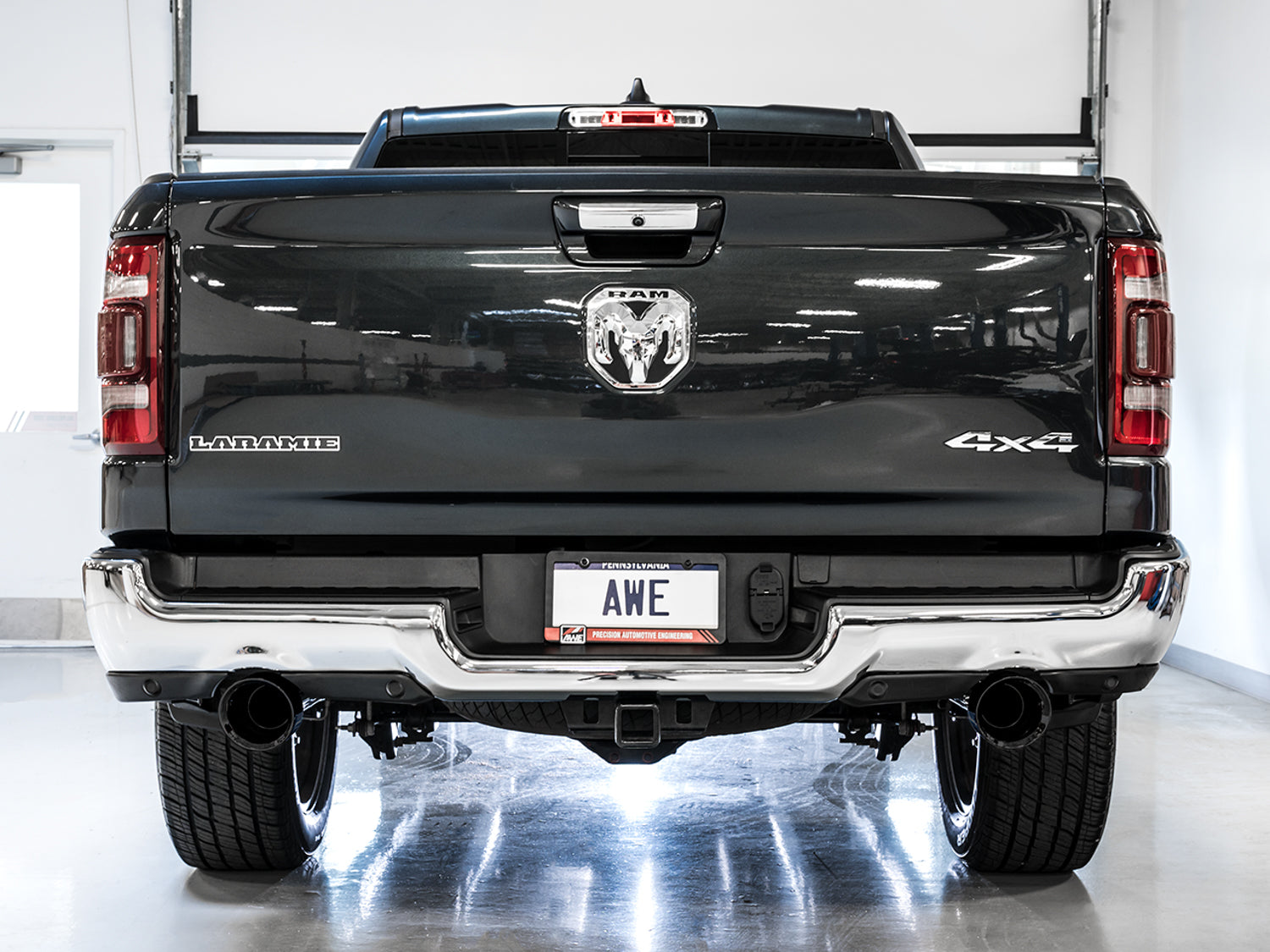 AWE 0FG Dual Rear Exit Catback for 5th Gen RAM 1500 5.7L (with bumper cutouts) - Diamond Black Tips - Mounted