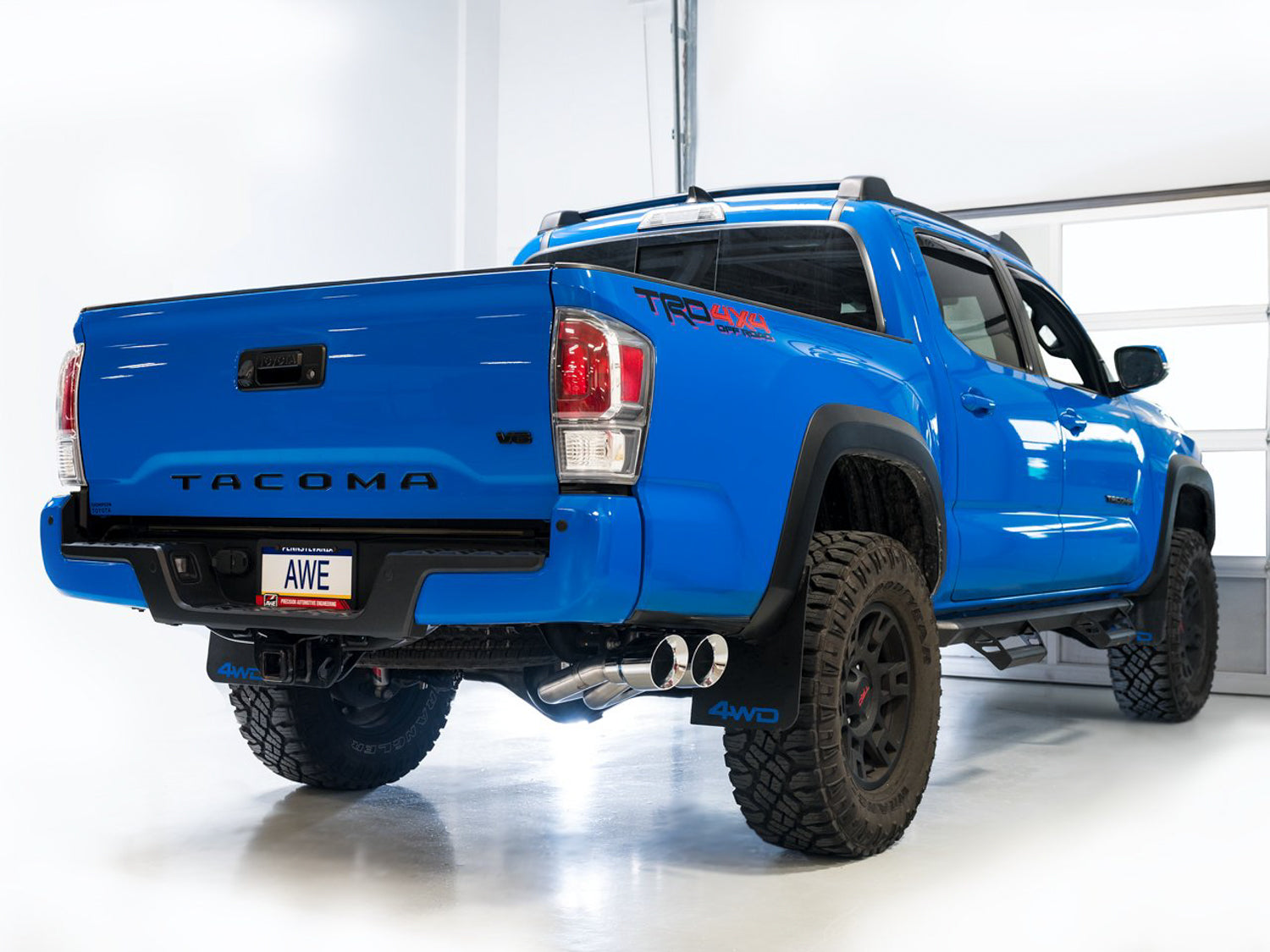 AWE 0FG Exhaust with BashGuard for 3rd Gen Tacoma - Dual Chrome Silver Tips - Mounted