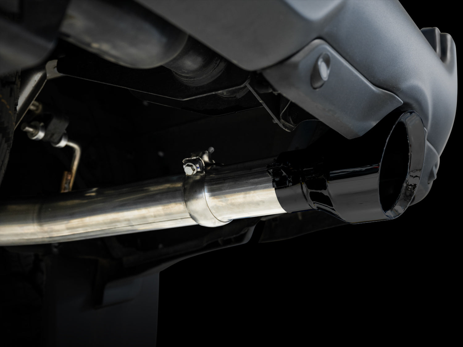 AWE 0FG Dual Rear Exit Catback for 4th Gen RAM 1500 5.7L (with bumper cutouts) - Diamond Black Tips - out of package