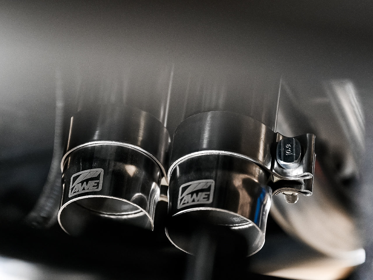 AWE 0FG Exhaust with BashGuard for 3rd Gen Tacoma - Dual Chrome Silver Tips - Close Up