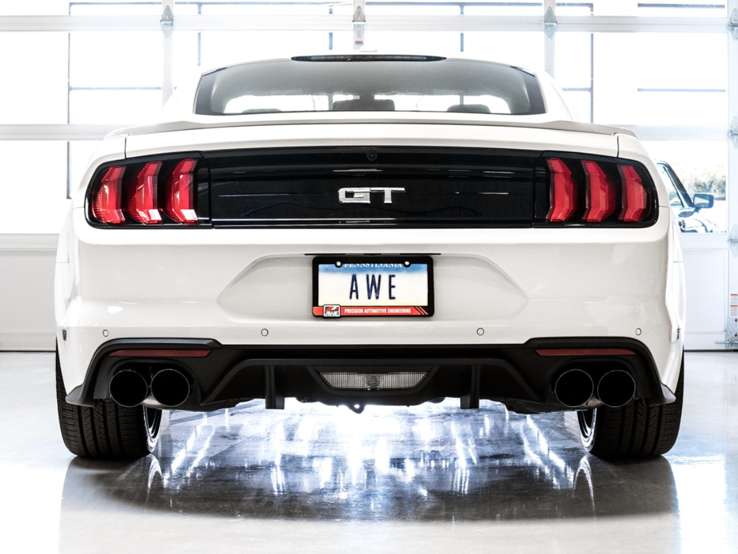 AWE Touring Edition Cat-back Exhaust for the 2018+ Mustang GT - Quad Diamond Black Tips - Mounted