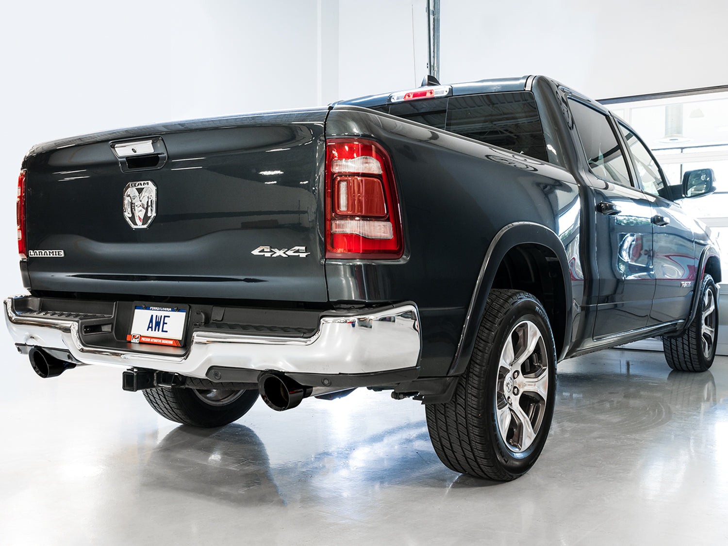 AWE 0FG Dual Rear Exit Catback for 5th Gen RAM 1500 5.7L (with bumper cutouts) - Diamond Black Tips - Mounted
