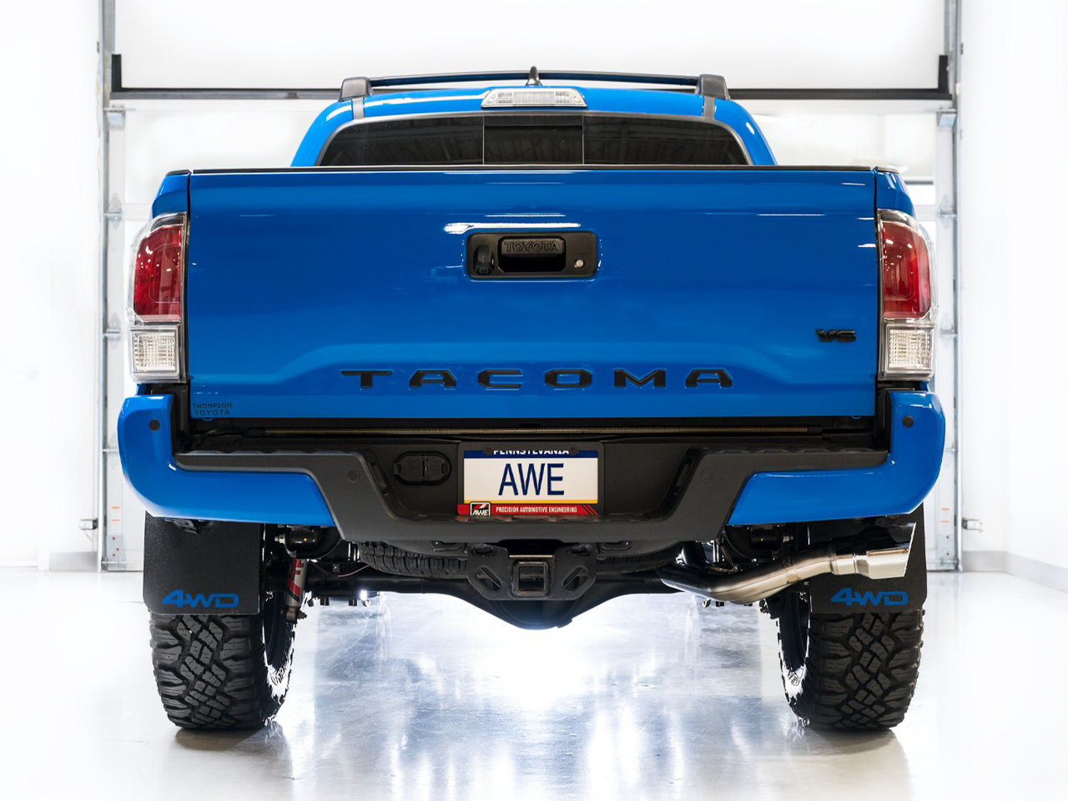 AWE 0FG Exhaust with BashGuard for 3rd Gen Tacoma - Dual Chrome Silver Tips - Mounted
